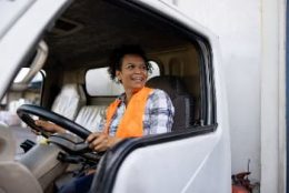Joyful truck driver getting ready to head out on the road